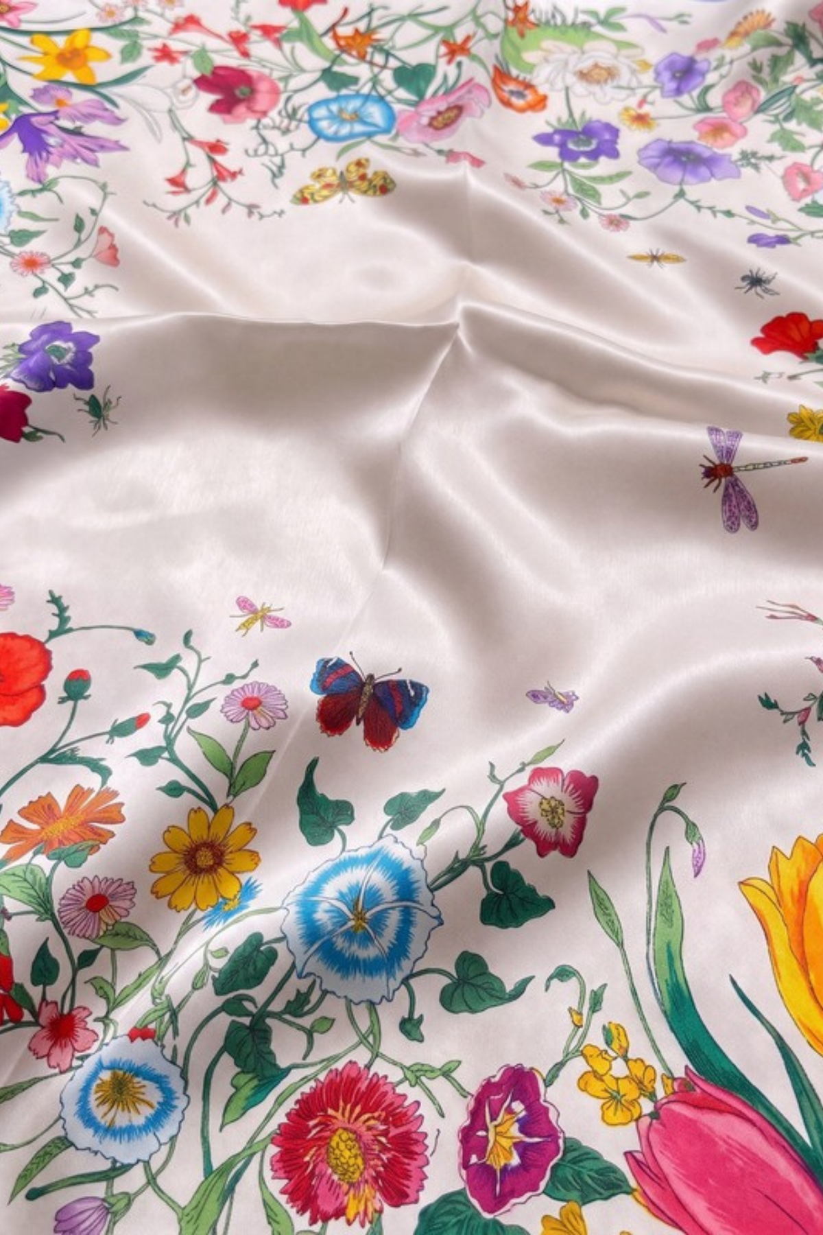 Close-up of the printed silk on the Gatz Lia scarf, showing the weave and print detail