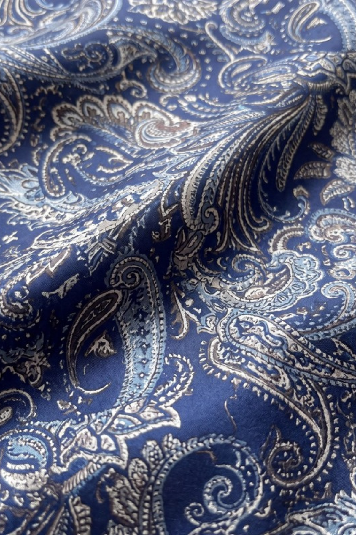 Close-up of the printed silk on the Gatz Sophia scarf, showing the weave and print detail