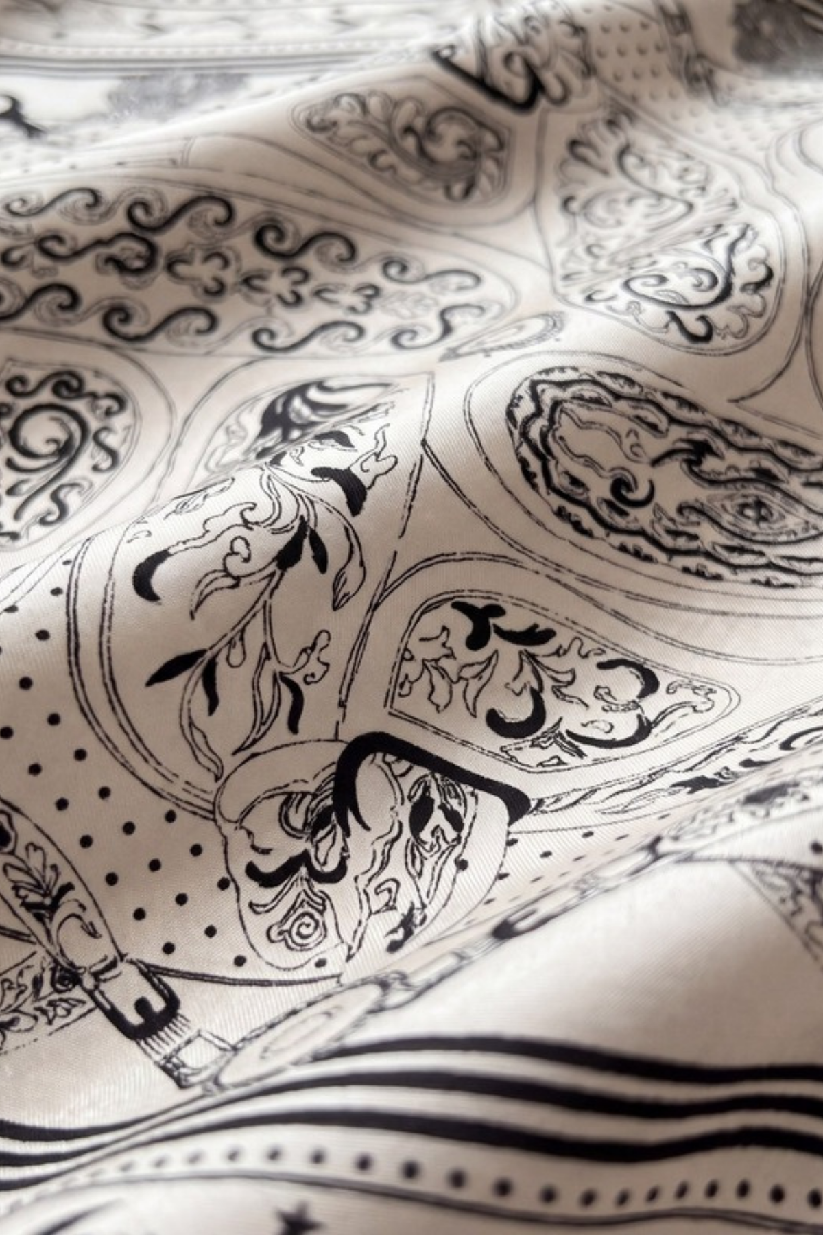 Close-up of the printed silk on the Gatz June scarf, showing the weave and print detail