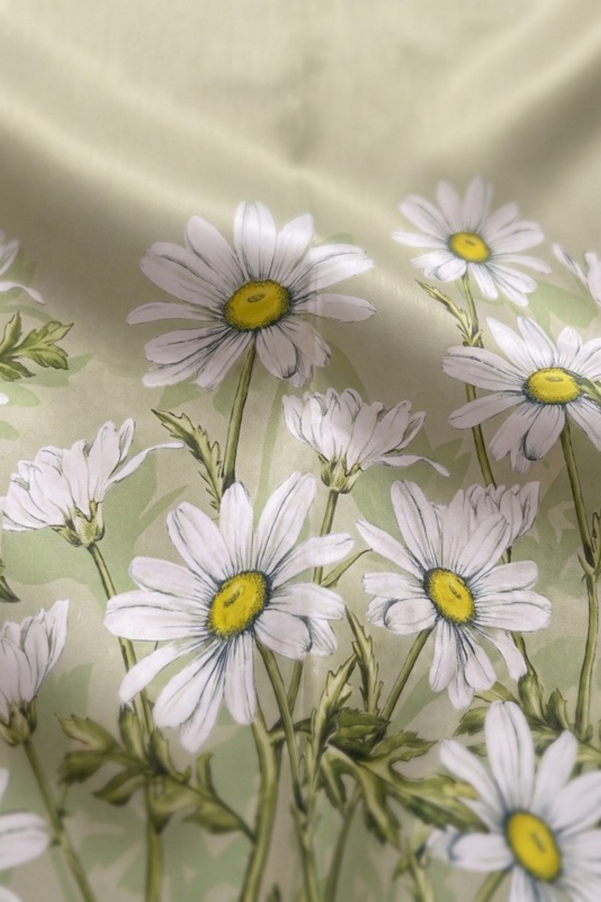 Close-up of the printed silk on the Gatz Daisy scarf, showing the weave and print detail