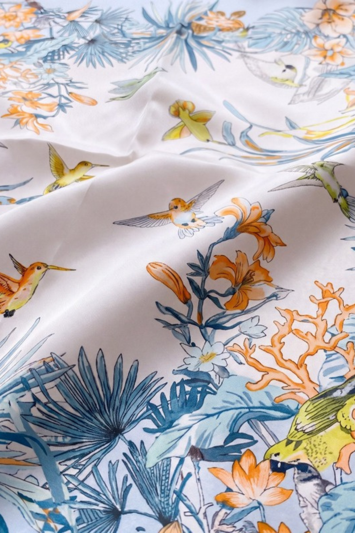 Close-up of the printed silk on the Gatz Janna scarf, showing the weave and print detail