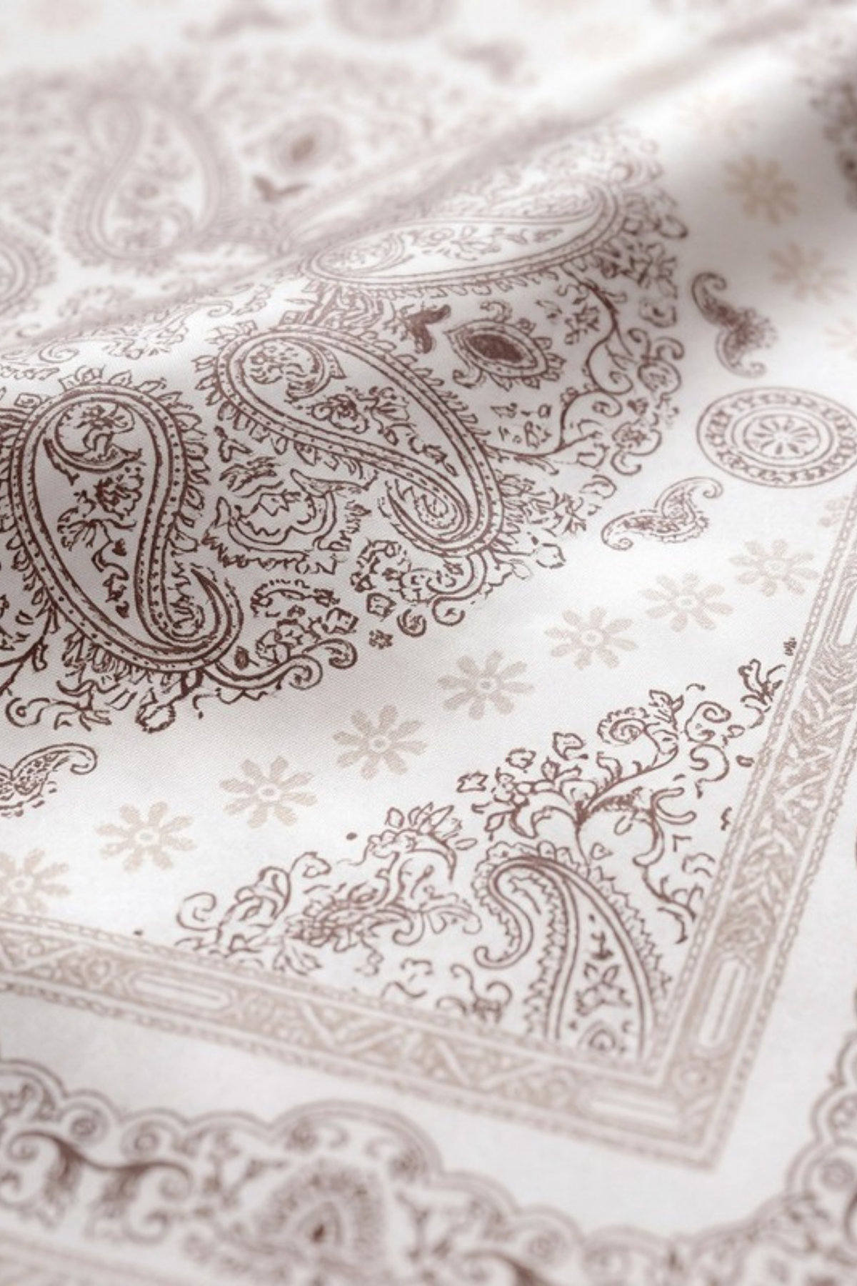 Close-up of the printed silk on the Gatz Jaime scarf, showing the weave and print detail