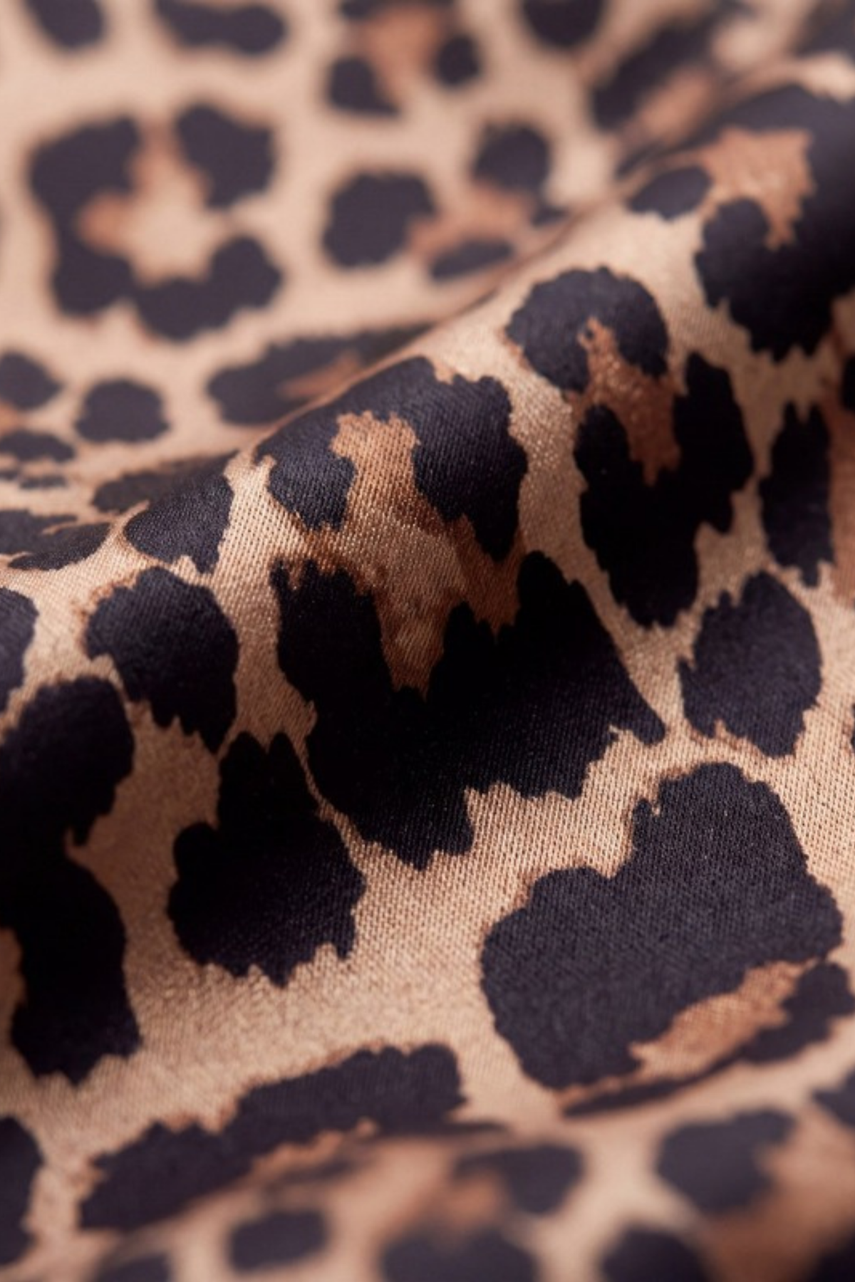 Close-up of the printed silk on the Gatz Akela scarf, showing the weave and print detail