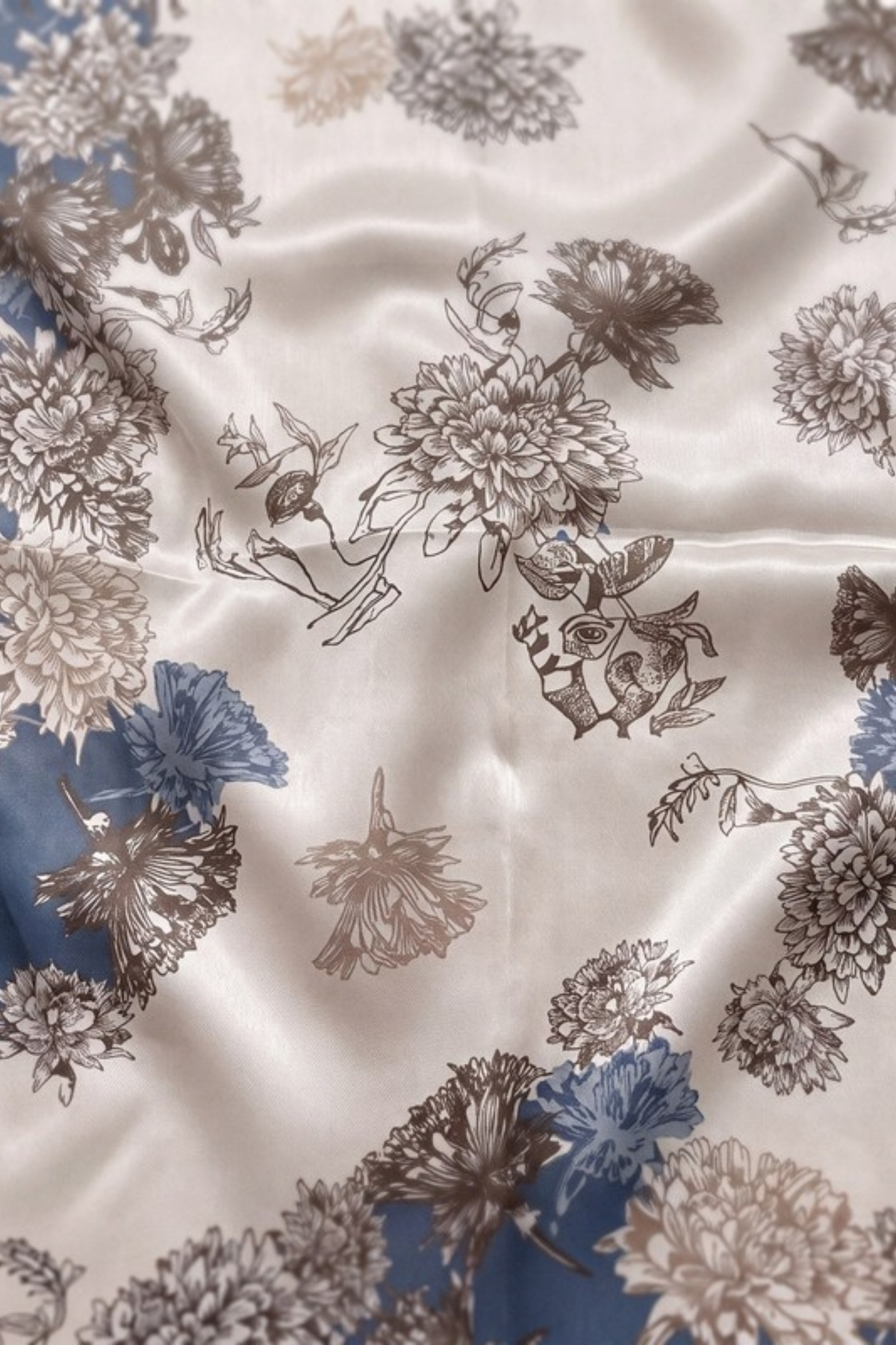 Close-up of the printed silk on the Gatz Charlotte scarf, showing the weave and print detail
