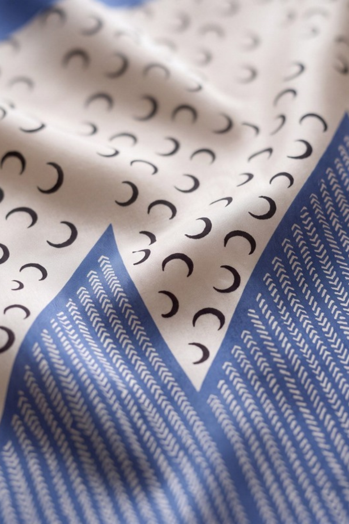 Close-up of the printed silk on the Gatz Angelina scarf, showing the weave and print detail