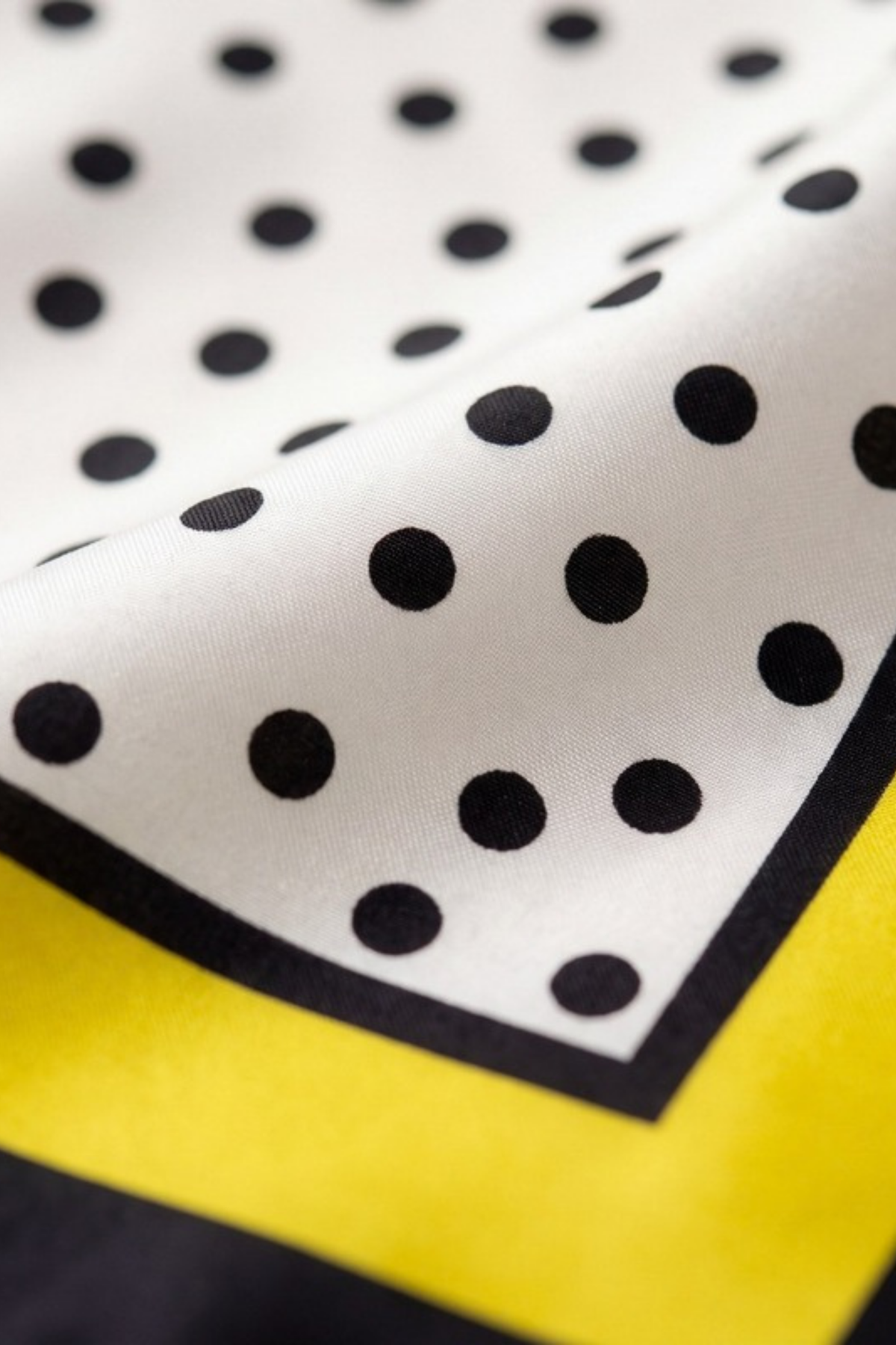 Close-up of the printed silk on the Gatz Margarit scarf, showing the weave and print detail