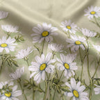 Close-up of the printed silk on the Gatz Daisy scarf, showing the weave and print detail
